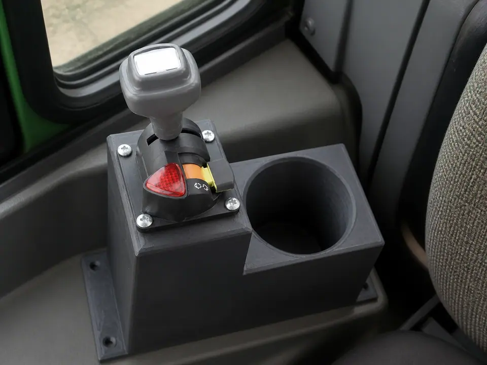 PTO control tower and cup holder fitted to their shared mount